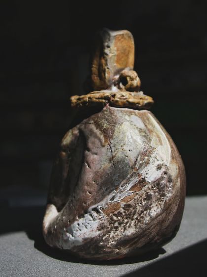 This wood-fired sculpture, inspired by the work of a mentor, captures the spirit of community and shared knowledge. The unpredictable surface is a result of letting go and allowing the fire to have its say.