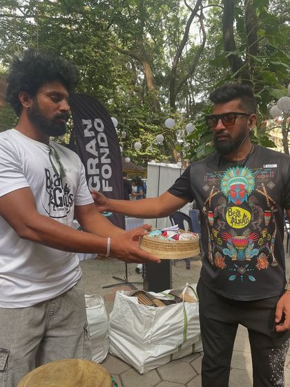 Another lucky winner receiving a hamper from The Whole Truth Foods at the Garage Sale.