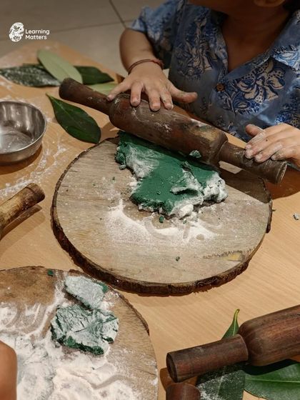 Using a rolling pin with playdough helps develop bilateral coordination, where both hands work together. This is a crucial skill for tasks like writing, cutting, and managing buttons and zippers.
