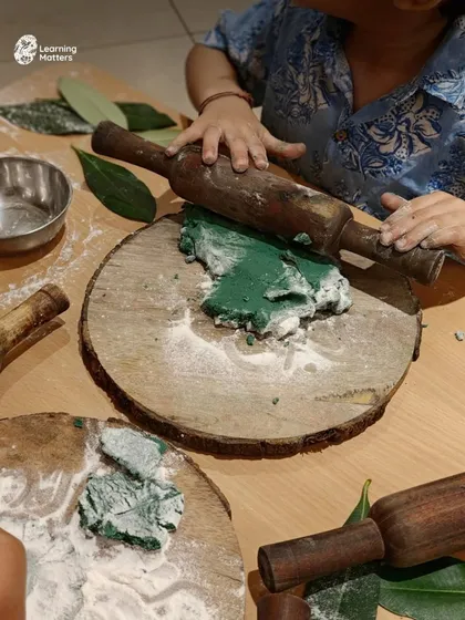 Kneading, rolling, and pressing playdough is powerful practice for small hands. Using natural materials like leaves and wooden rolling pins, children build fine motor strength and finger dexterity, all while calming the mind and sparking creativity.