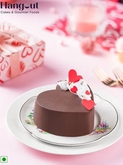 This heart-shaped Dutch Truffle cake is made with pure European chocolate for a unique, balanced flavor. It's a simple yet elegant dessert for Valentine's Day.