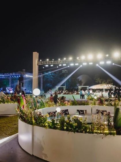 Another perspective of the modern, minimalist entryway seating we designed. The clean lines and integrated planters offer a sophisticated welcome for guests.