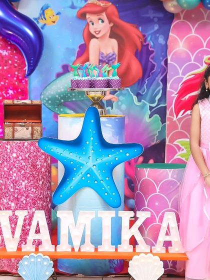 An enchanting 'Under the Sea' party with a Little Mermaid theme. We used shimmering backdrops, coral and seashell props, and character cutouts to create a magical ocean kingdom for the birthday girl's 6th birthday.