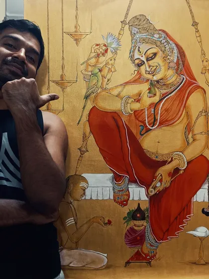 Here I am with my completed work, "PoornaChandrika," a large commissioned painting of Devi Kamakshi. This piece took over a year and a half to complete, a testament to the slow, patient process of creating 'heartwork' that is deeply invested with research and devotion.
