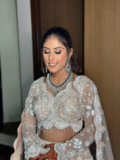 A final look at this ivory dream. The skin is glowing, the eyes are sparkling, and she's ready for her sangeet.