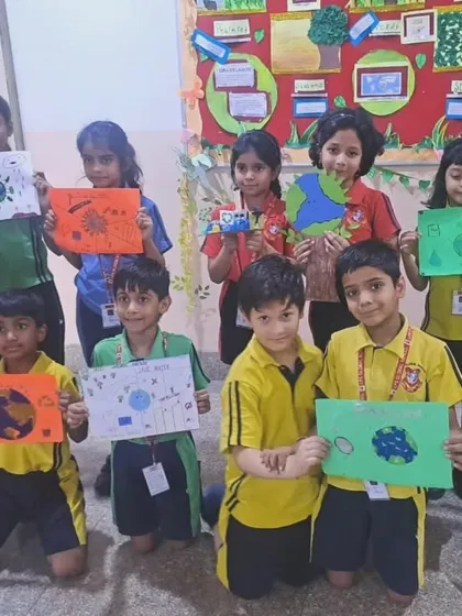 A classroom full of young eco-champions with their Earth Day artwork, ready to be the guardians of tomorrow's Earth.