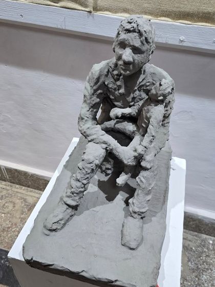 A powerful clay sculpture seen during our visit to the College of Art exhibition, sparking inspiration.