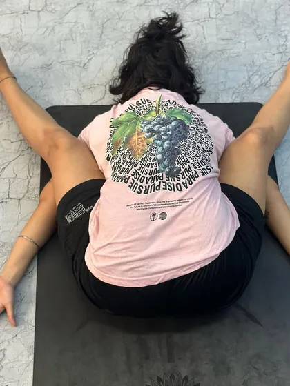 A student in Kurmasana during our Malad class. This deep forward fold and hip opener is a milestone in the Ashtanga series and requires a great deal of flexibility and surrender.