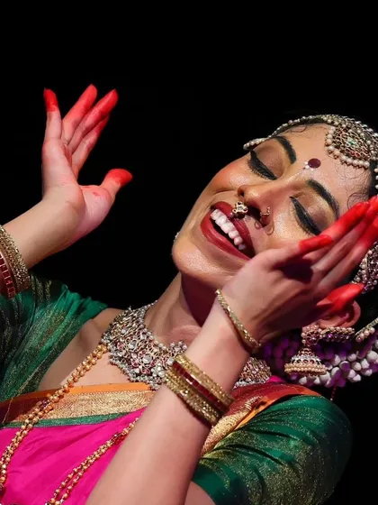 The pure, uninhibited joy of surrendering to the dance. This expression captures the feeling of 'bhakti' or devotion that is at the core of my work. My goal in every choreography is to help both the dancer and the audience feel this connection.