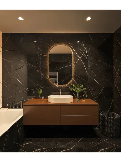 We transformed this bathroom into a spa-like sanctuary using dramatic black marble with striking white veins. The floating wooden vanity, backlit oval mirror, and minimalist fixtures create a bold yet elegant look.