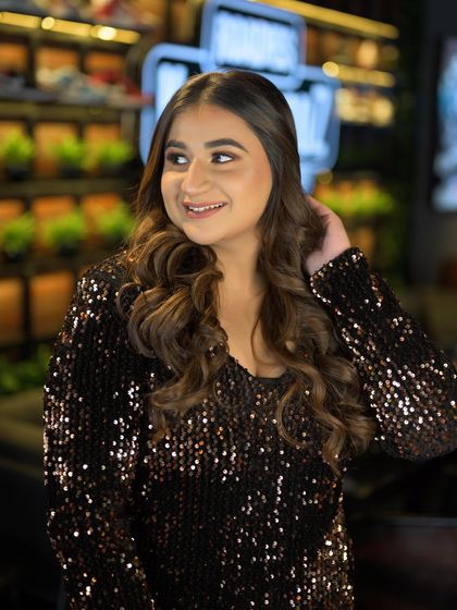 Another shot from the masterclass. We focused on creating a look that is both glamorous and wearable, perfect for any party or event.