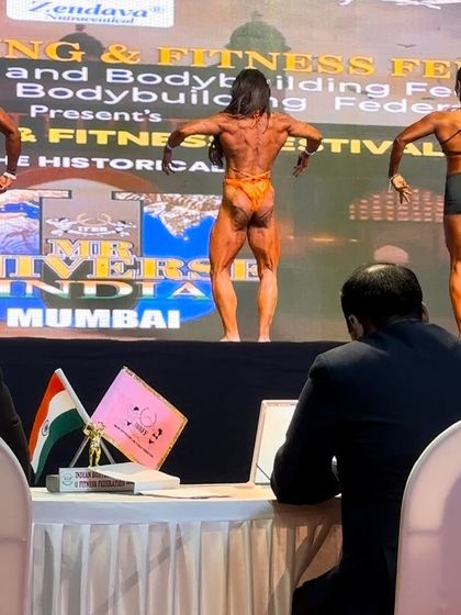 Judging the women's physique category at Mr. Universe. My athlete Anshul (in orange) took silver. This shows the high caliber of competition we prepare for.