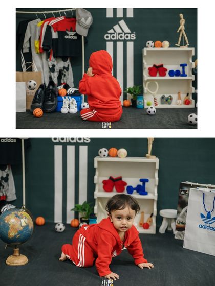 This little one is ready for the big leagues in his Adidas-themed photoshoot. Surrounded by soccer balls and sports gear, this session was all about capturing his playful and energetic spirit.