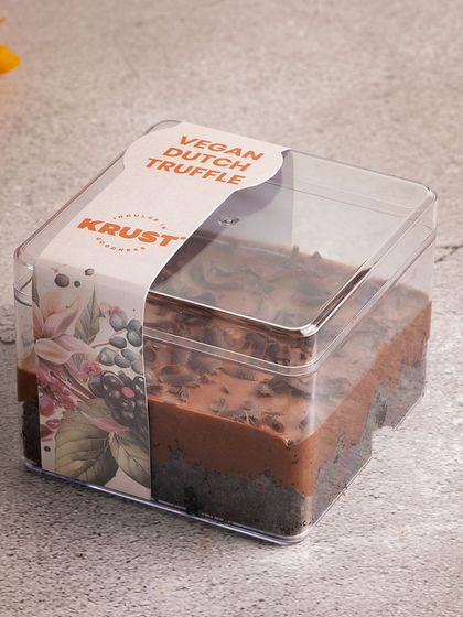 A closer look at the packaging for our Vegan Dutch Truffle. The beautiful label reflects the quality of the delicious plant-based dessert inside.