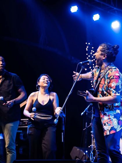 Having a blast on stage with the band. The joy and camaraderie you see here is real, and it translates directly into the music.