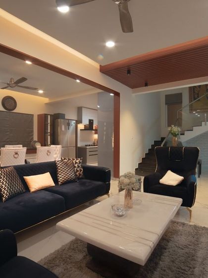 Houzlook - Full Home Interior Design & Turnkey Execution Luxurious Living & Dining Spaces photo 8