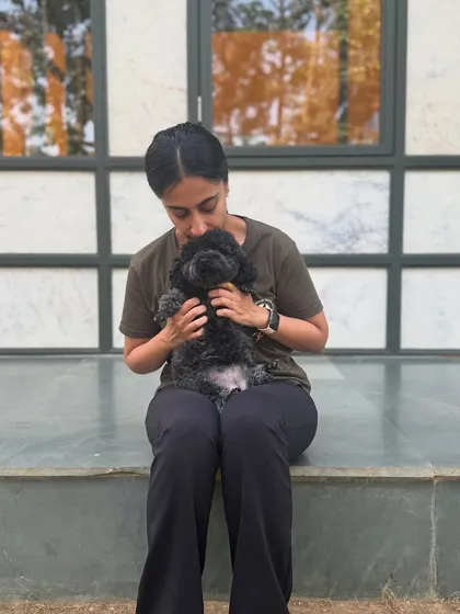 Cuddling the teeny tiniest member of our pack, baby Mango.
