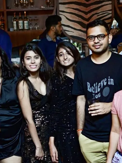Posing for a picture with some of the regulars. Building a community around my music nights is what it's all about.
