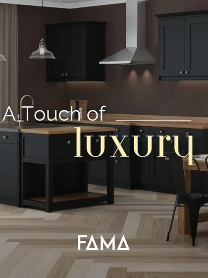 A touch of luxury. This kitchen pairs classic black shaker cabinets with warm butcher-block countertops and an open-shelf island, creating a modern farmhouse aesthetic that is both cozy and chic.