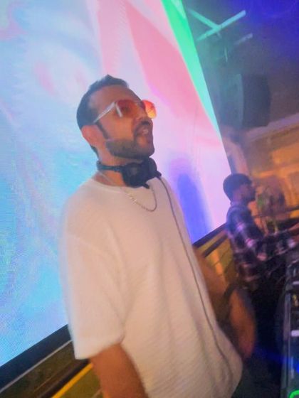 A candid moment of me singing along to a track. I'm as into the music as the crowd is.