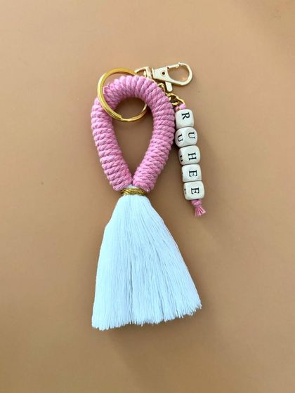 A personalized tassel keychain for "Ruhee". This style is simple, elegant, and can be customized with any name and color.