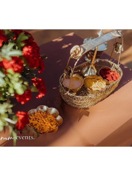 Traditional items for the ceremony, beautifully arranged with fresh flowers.