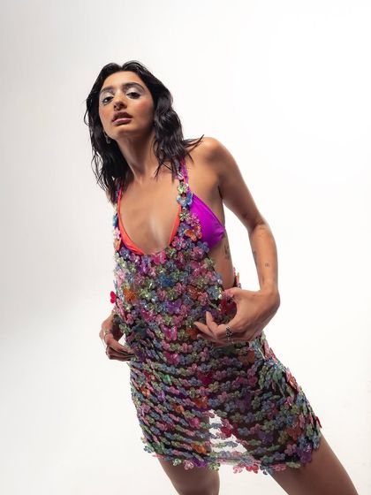 A close-up of the intricate floral sequin dress from the shoot. The level of detail in fashion inspires the level of detail I put into my events.