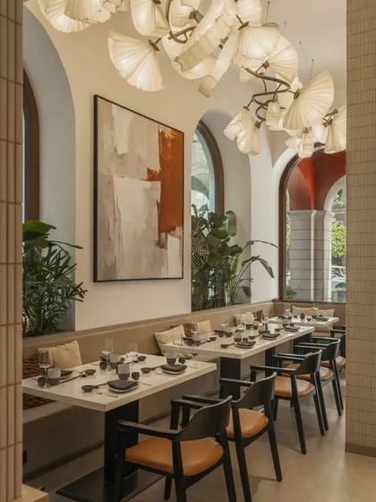 For Otoki, a Japanese restaurant in Colaba, the goal was quiet strength. The space is calm and minimal, using a palette of warm woods, soft neutrals, and custom lighting to create a timeless, not trendy, atmosphere. It shows our ability to create a specific, rooted vibe.