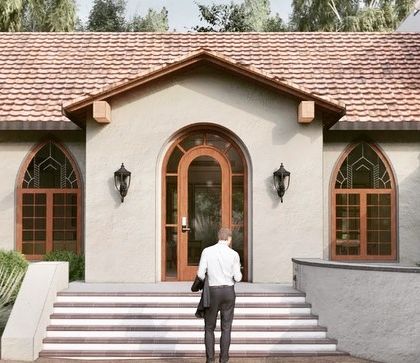 Another view of the entrance render for "The Abbey House," highlighting the blend of traditional forms with a clean, modern finish.