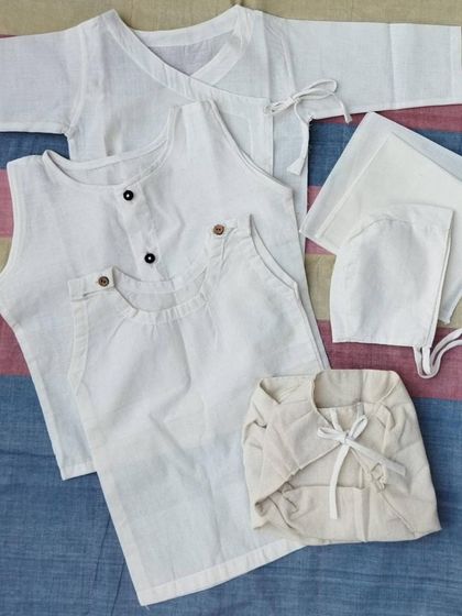 The chemicals in clothing can be absorbed through a baby's delicate skin. We advocate for safe, non-toxic baby products, like these undyed, handwoven pure cotton clothes, to ensure a healthy start for your little one.