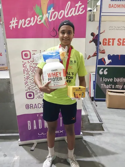 Another victory pose from Sneha Kumar at the Summer Badminton Challenge. Her dedication to rigorous practice sessions clearly paid off with double wins.