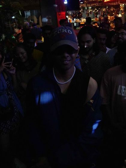 A dancer in the crowd at our Social Sunday Sundowner, feeling the music.