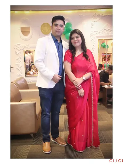 A well-dressed couple posing for a formal portrait at an event. I provide classic, timeless photos for you to remember your day.