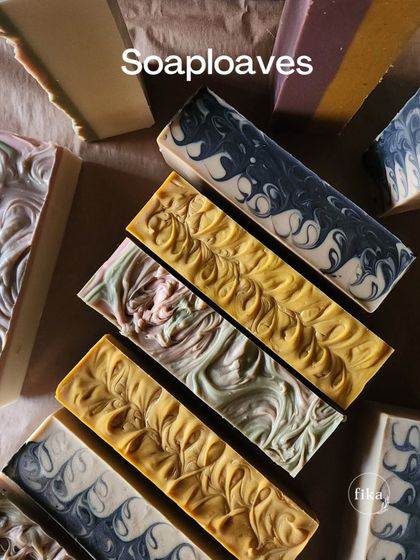 A collection of my soap loaves, ready to be cut. From confetti to charcoal swirls, each one is an example of my commitment to clean ingredients and honest, handmade goodness.