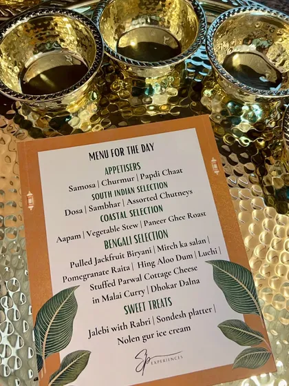 The detailed menu for our "Flavours of India" sit-down lunch, promising guests a journey from Samosa Chaat to Nolen Gur ice cream.