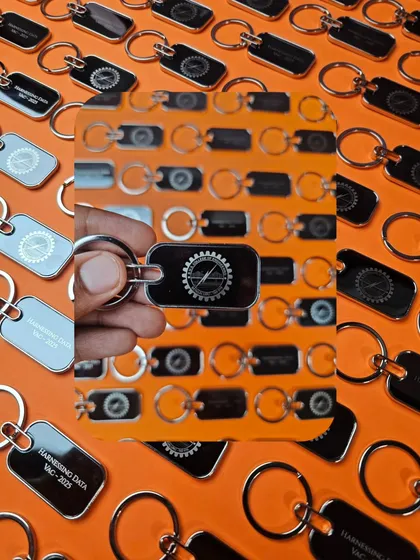 I can handle orders of any size. Here's a look at a bulk order of 200 custom-branded metal keychains I created for a college event, showcasing my capacity for corporate and event gifting.