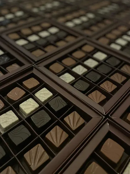 An array of our 16-piece truffle boxes, showcasing different flavors and textures. A perfect choice for corporate gifting or large family celebrations.
