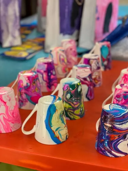 Every child leaves the party with their own unique creation. These beautiful marbled mugs are a super popular take-home craft, made by the kids themselves during the party. It's a wonderful, lasting memory of a fun-filled day.