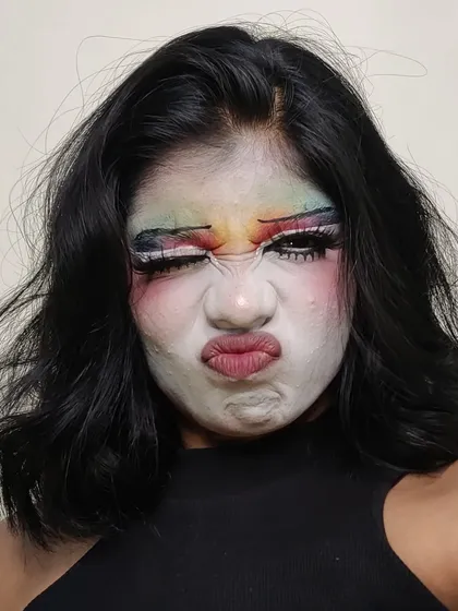 A fun, expressive shot of the clown makeup, showing how it moves with facial expressions.