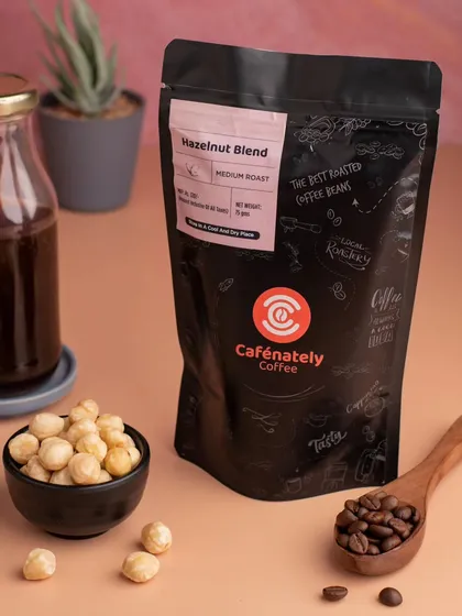 A shot for Cafenately's Hazelnut Blend coffee. We used natural elements like hazelnuts and a wooden spoon to give the photo an earthy, aromatic feel.