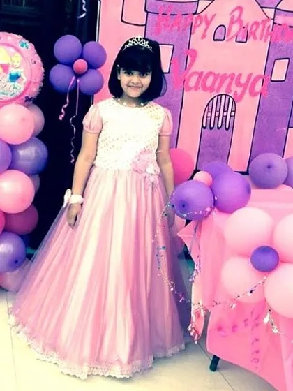 Making birthday wishes come true with this custom princess gown for a little client. The design features a delicate pearl-work bodice and a flowing tulle skirt, creating a magical look for her special celebration.