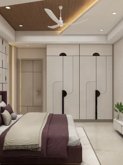 This angle shows the full-wall wardrobe with its unique, abstract black-and-white pattern, which is a running theme in the room's design.