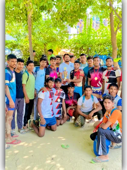 Another group photo celebrating a tournament victory.