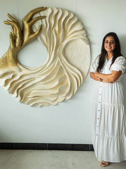 A full-length view with 'The Awakening Cycle series 1'. This perspective shows how the artwork interacts with the space and the human form, inviting a personal connection.