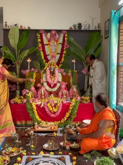 The beautifully decorated altar, a focal point for our prayers and gratitude. The entire setup is an offering to the divine.