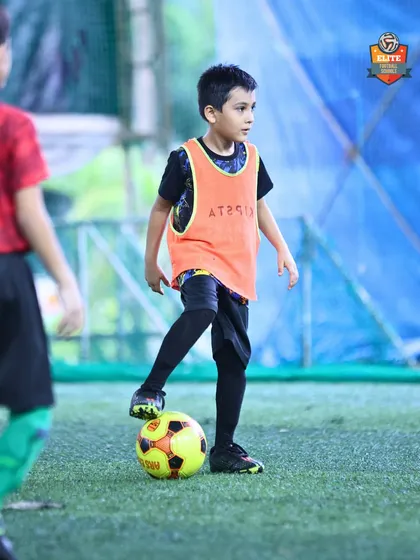 A player practices ball control, a fundamental skill that is the foundation of our training philosophy.