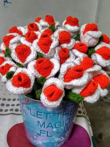 A special bouquet I created with a patriotic theme, featuring white and orange flowers in a bucket. It was my way of celebrating Independence Day with my craft.