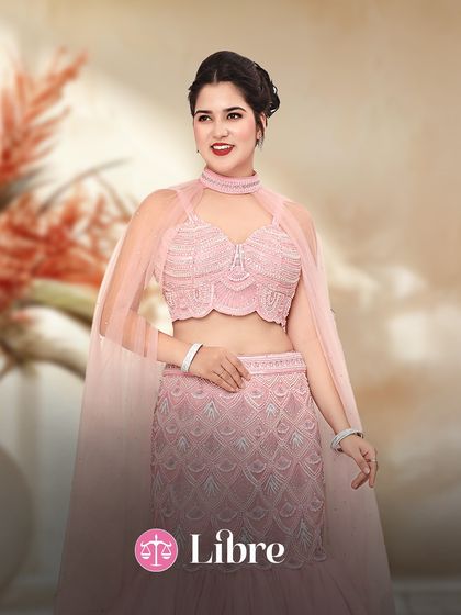 Libra, you seek balance and beauty. This baby pink fish-cut lehenga with a modern cape is the perfect blend of grace and high fashion.