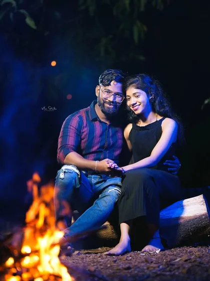 There's something magical about a shoot at night. A cozy bonfire provides the perfect warm, dramatic lighting for intimate and romantic pre-wedding photos that feel both adventurous and personal.
