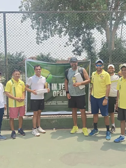 A group of competitors and organizers at the Ad In Tennis Open. We focus on creating a professional and respectful environment for all players.